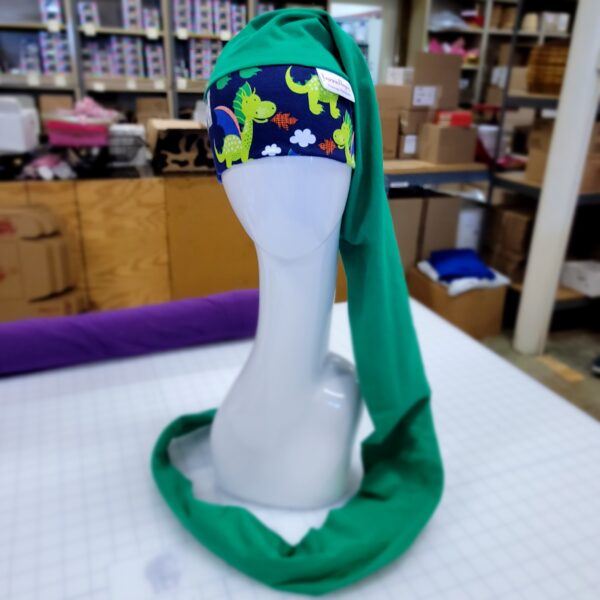 Green Happy Dragon NillyNoggin EEG Cap on mannequin