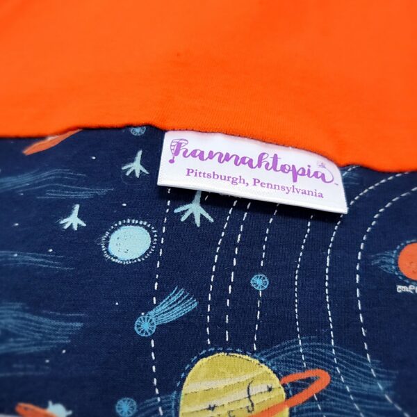 Orange NillyNoggin EEG Cap with Navy Planets and Solar System design showing close up