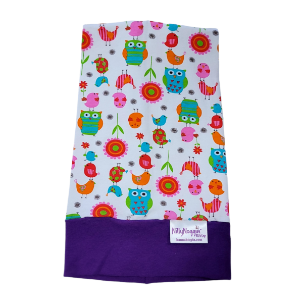 nillynoggin eeg cap laying flat with purple and owls