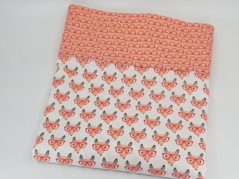 Pillowcase with pattern of fox wearing glasses, border of pink glasses