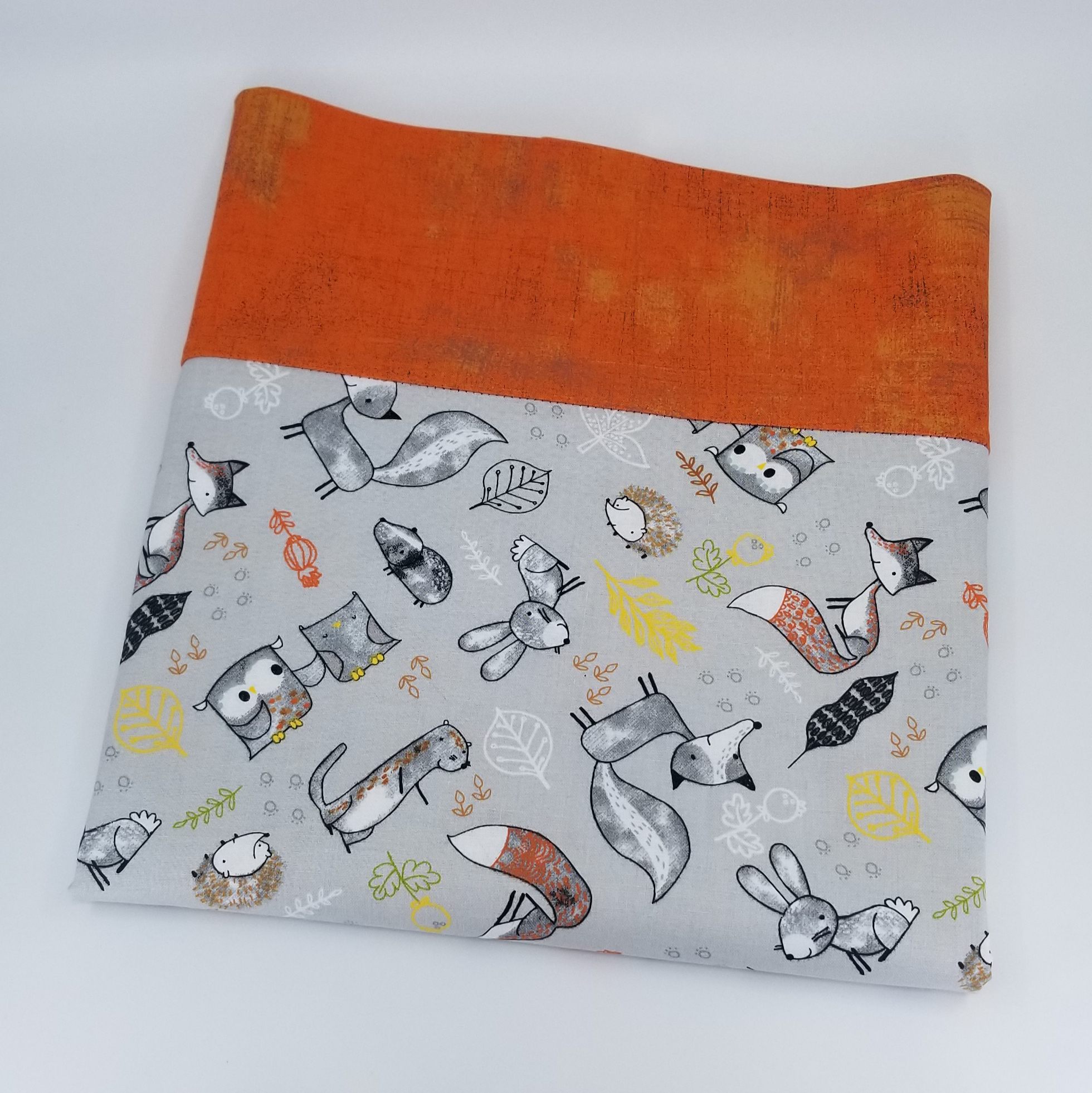 Handmade 100% cotton pillowcase with pattern of forest animals and orange border